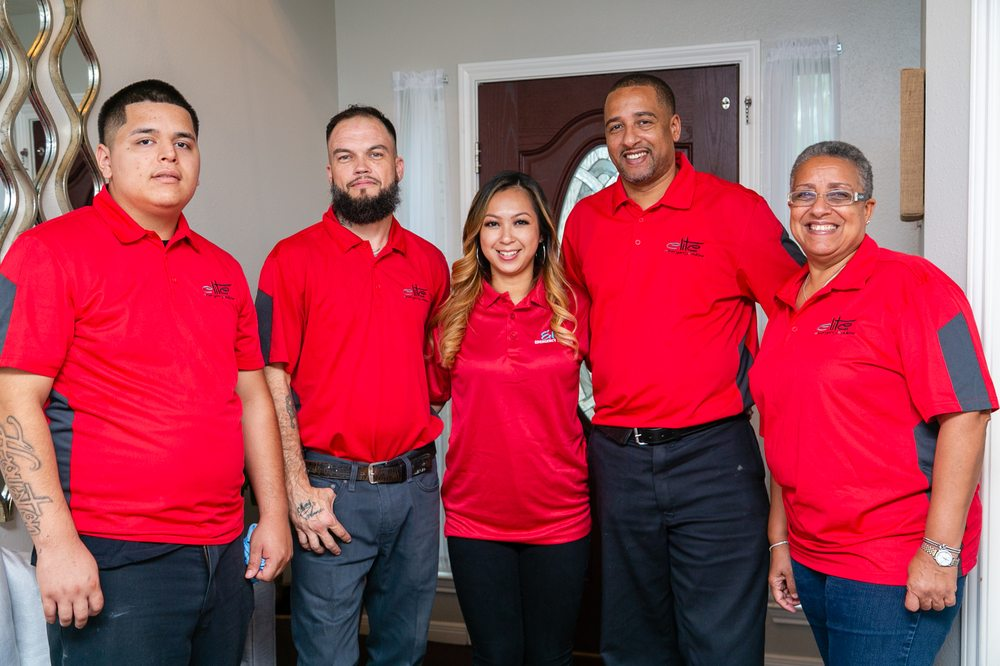 Erick Ashe, owner / operator of Elite Emergency Solutions, with the restoration crew at a customer's home